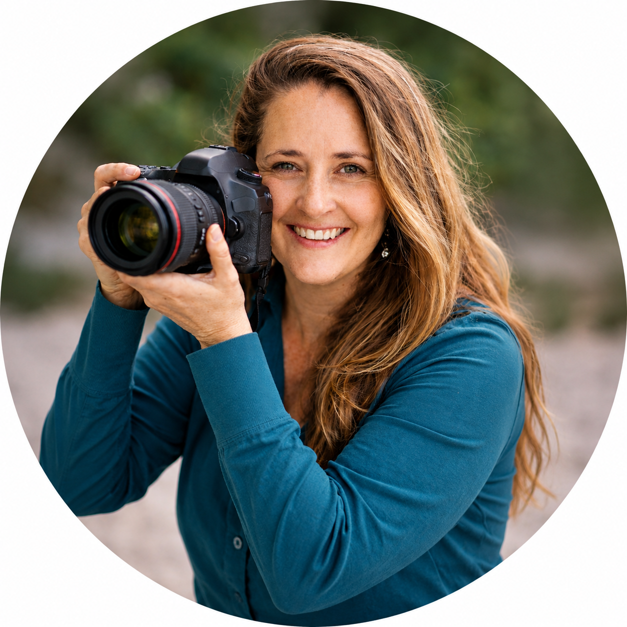 Portrait of Beata Nykiel holding a camera